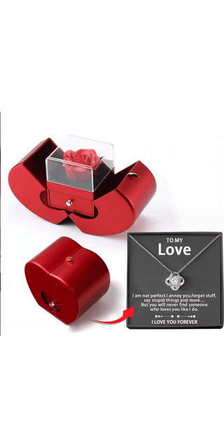 Elegant red jewelry box with delicate heart-shaped ring holder, a thoughtful gift for eternal moments of beauty and love.