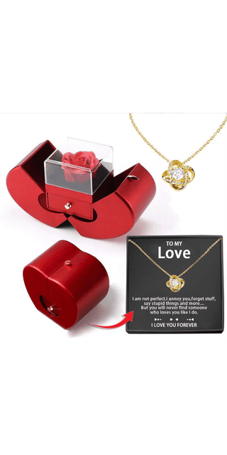 Elegant pendant necklace and gift box with rose on minimalist display