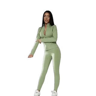 Stylish mint green activewear set featuring fitted leggings and a matching jacket for a coordinated athleisure look.