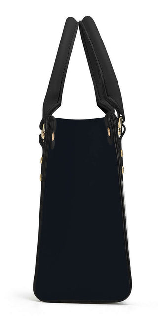Elegant geometric black tote bag from K-AROLE featuring chic leather accents for a stylish women's athleisure look.