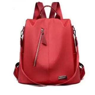 Vibrant red backpack with zipper pocket for women, stylish and functional school bag from K-AROLE.