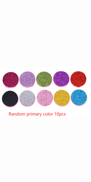 Vibrant primary colored glitter powder spheres arranged in a grid on a plain white background.
