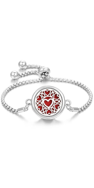Elegant stainless steel adjustable aromatherapy bracelet with a circular pendant featuring a red heart pattern design, perfect for adding a touch of style and relaxation.