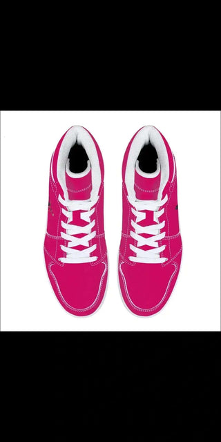 a close up of a pair of pink shoes 