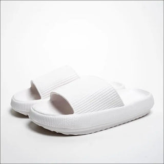 Experience timeless elegance with K-AROLE™ white slippers. The pristine white color exudes sophistication and versatility, making these slippers a perfect companion for any occasion. Slip into pure comfort and style with K-AROLE™."