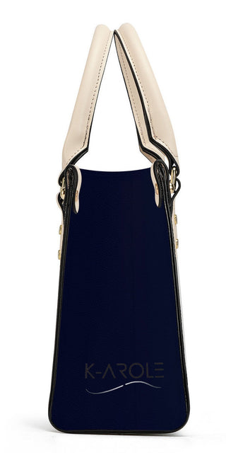 Elegant navy blue designer tote bag from K-AROLE, featuring stylish leather details and a minimalist design for versatile fashion.