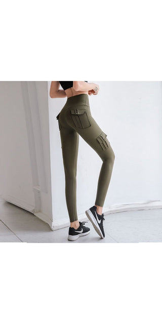 Stylish olive green cargo leggings with pockets, worn by a female model against a white background. The sleek, fitted design and stretchy material offer both comfort and a fashionable look.