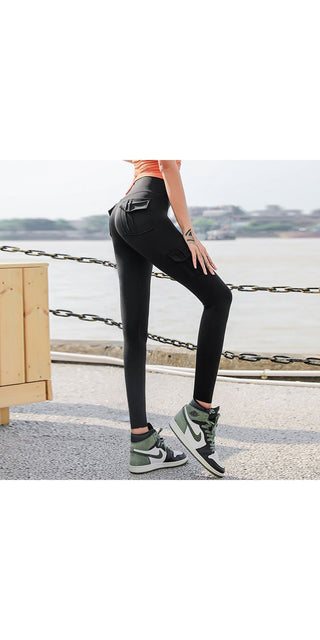 Stylish black leggings with side pockets, paired with trendy athletic sneakers on a woman standing by the ocean.