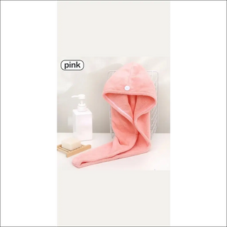 Plush pink microfiber hair towel with button closure, perfect for fast, absorbent hair drying.