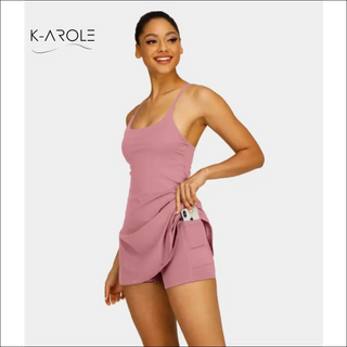 Woman's pocketed pink tennis dress for yoga and running from K-AROLE fashion brand