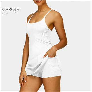 Woman's white pocketed tennis yoga running dress from K-AROLE
