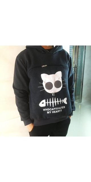 Stylish black cat-themed hoodie with fishbone graphic and text "Who Ate My Heart?" on display.