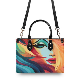 Vibrant and artistic handbag with colorful abstract face design, leather trim, and adjustable shoulder strap from the K-AROLE fashion brand.