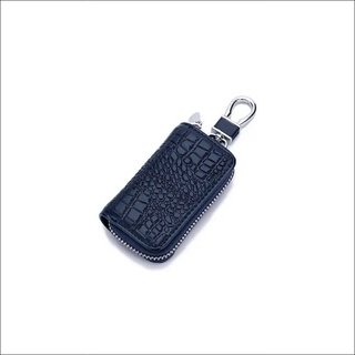 Premium leather key holder with zipper pouch for organizing car keys, wallet, and accessories. Sleek, stylish, and durable design in a classic navy blue color.