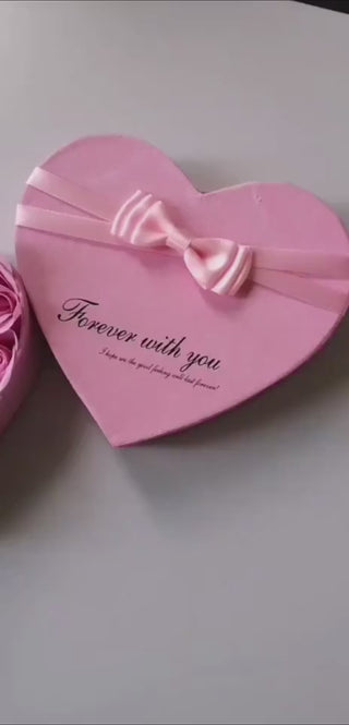 Elegant heart-shaped pink gift box with bow, perfect for Valentine's Day or a special occasion at K-AROLE.