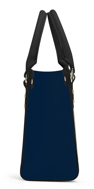 Exquisite Suede and Leather Tote Bag by K-AROLE. This stylish navy blue tote bag features a sleek and sophisticated design with contrasting black straps for a chic look.