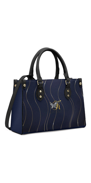 Elegant navy blue quilted leather tote bag with gold accents by K-AROLE. The structured design and textured pattern create a stylish and timeless look perfect for everyday wear.