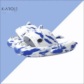 Vibrant tie-dye bathroom slippers with a playful shark design, showcasing the K-AROLE brand and offering a stylish and comfortable footwear option.