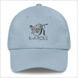 Stylish dad hat with the K-AROLE logo embroidered on the front, displayed against a plain white background.