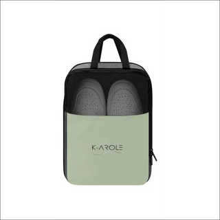 Stylish women's running shoes by K-AROLE featured in a modern, mint-colored shoe bag with discreet branding.