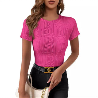 Vibrant pink, short-sleeved, slim-fit women's top with intricate vertical pleating detail.