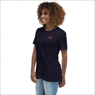 Relaxed and comfortable women's black t-shirt with a small butterfly logo, worn by a young woman with curly brown hair against a white background.