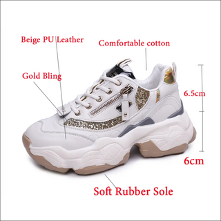 Beige PU leather women's sneakers with gold bling detail, comfortable cotton interior, and soft rubber sole. The sneakers are displayed on a plain background, showcasing their trendy and stylish design.