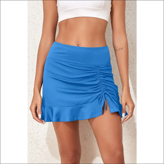 Blue ruched swim skirt with elastic waist, showcasing a fashionable and functional beachwear design.