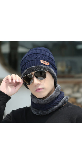 Cozy blue knitted hat and sunglasses - stylish winter accessories for warmth and fashion.
