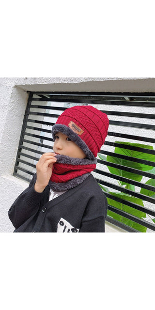 Cozy Knitted Hat and Scarf: Stylish winter accessories in vibrant red, providing warmth and fashion for the cold season.