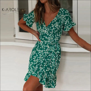 Floral print boho beach dress from K-Arole's 2024 summer collection - featuring ruffle sleeves and a wrap-around silhouette for a stylish, vacation-ready look.