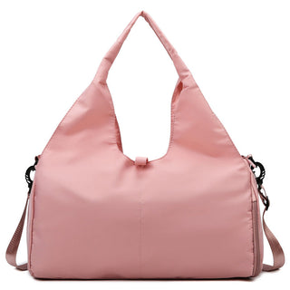 Large pink sports and fitness bag with dry and wet separation compartments, suitable for carrying yoga mats and other fitness accessories.