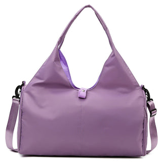 Large purple yoga bag with separated dry and wet compartment for convenient storage and travel.