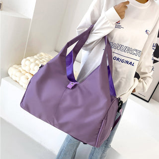 Lavender yoga/fitness bag with dry and wet separation compartments and large capacity for carrying yoga mats or other workout gear.