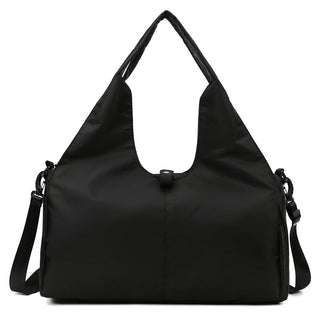 Stylish black yoga bag with large capacity storage and separate wet/dry compartments, perfect for fitness and travel.