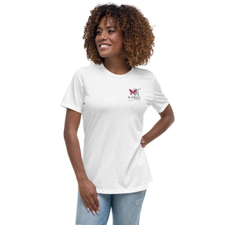 Smiling woman wearing a relaxed white t-shirt with a small K-AROLE logo graphic.