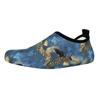 Stylish men's water sports skin shoes featuring a vibrant tropical print with palm leaves and leopard patterns on a blue background. The flexible, slip-on design makes these shoes ideal for water activities and beach outings.
