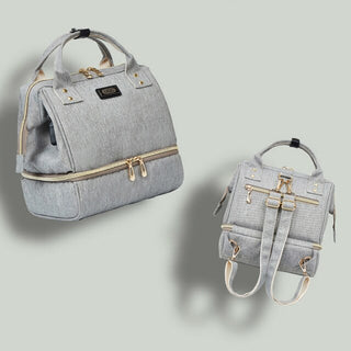 Grey and gold modern diaper bag backpack with multiple pockets and zippers, ideal for moms, maternity, and baby care on-the-go.