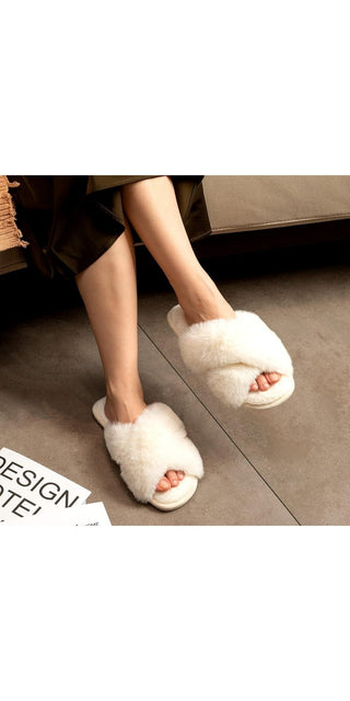 Plush white open-toe slippers with soft, furry texture for cozy indoor comfort.