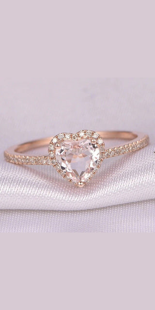 Elegant rose gold heart-shaped wedding ring with sparkling crystals for women's bridal jewelry and party accessories.