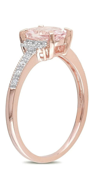 Elegant rose gold ring featuring a dazzling oval-cut morganite center stone surrounded by a sparkling diamond halo, for a timeless and sophisticated look.