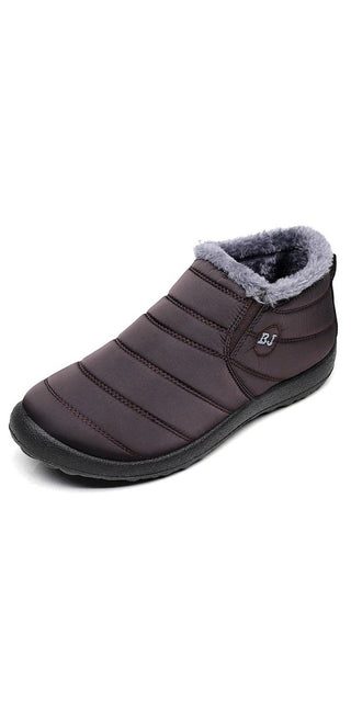Comfortable slip-on winter boots for women in dark gray color, featuring a cozy faux fur lining for warmth and traction on snowy surfaces.
