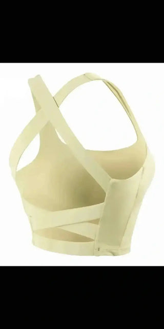 Cream-colored sports bra with a supportive and comfortable design, featured against a plain black background.