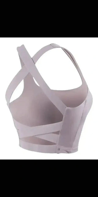Supportive and stylish sports bra with crisscross design for active women, perfect for yoga, running, or any workout.