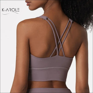 Stylish cross-back sports bra with supportive push-up design, showcasing a trendy women's activewear piece from the K-AROLE fashion brand.