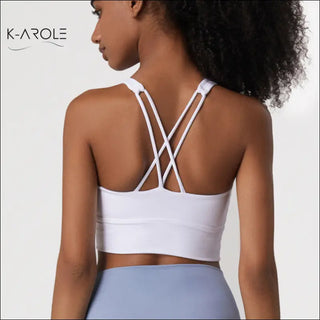 White cross-back sports bra with push-up shape from K-AROLE women's fashion brand.