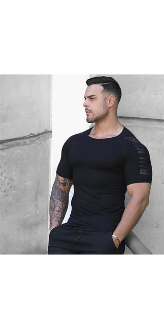 Stylish Black Compression Tee for Athletic Men - Slim-fit, moisture-wicking design with sleeve logo accents.