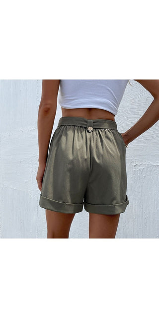 Stylish green satin shorts for women with a belted waist, displayed on a female model against a plain background.