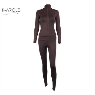 Fitted, stylish burgundy leggings and jacket set by K-AROLE. Sleek, comfortable athletic wear for an active lifestyle.