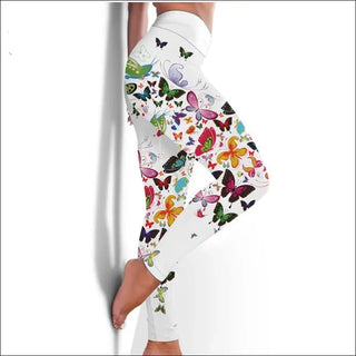 Colorful floral and butterfly printed leggings from the K-AROLE Spring/Summer 2024 collection, showcasing a vibrant and stylish women's fashion garment.